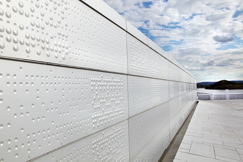 Perforated sheets from RMIG with a pattern of concave and convex forms used for the facade of Oslo Opera House